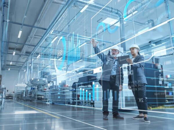 Factory Digitalization: Two Industrial Engineers Use Tablet Comp Factory Digitalization: Two Industrial Engineers Use Tablet Comp
